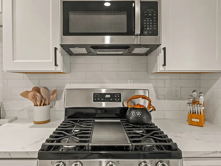 Newly renovated kitchen that is fully stocked. Easily enjoy home cooked meals during your stay.
