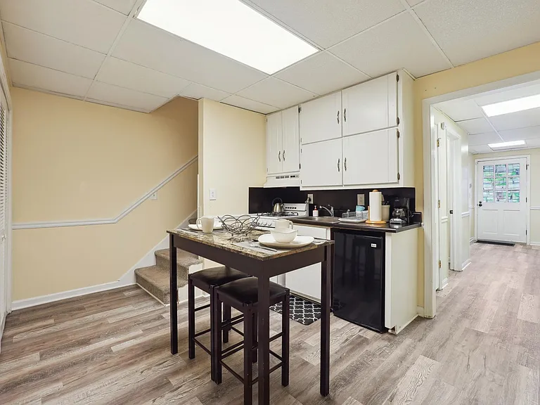 Small full Kitchen with Breakfast table -Basement Level