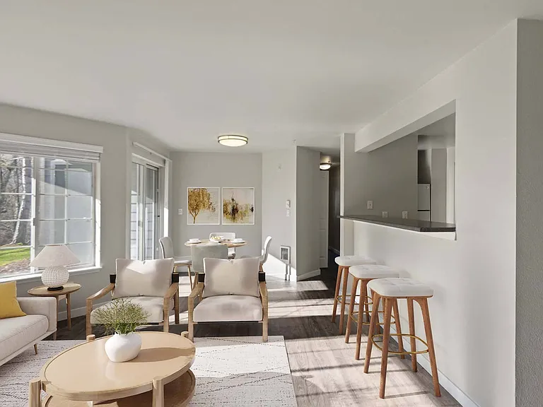 Relax, entertain, and connect in this open-concept living room that flows right into the kitchen
