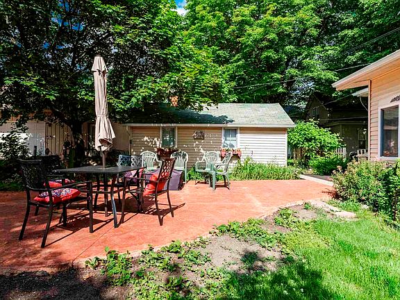 Outdoor Brick Patio & Carriage House