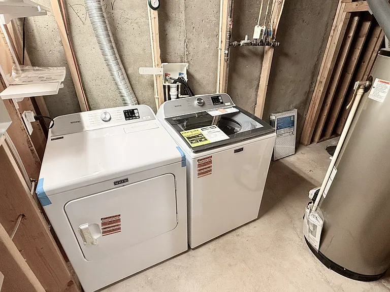 Washer & Dryer in Utility room in Basement