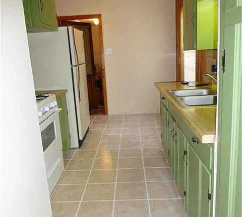 Kitchen with recently installed tile floors