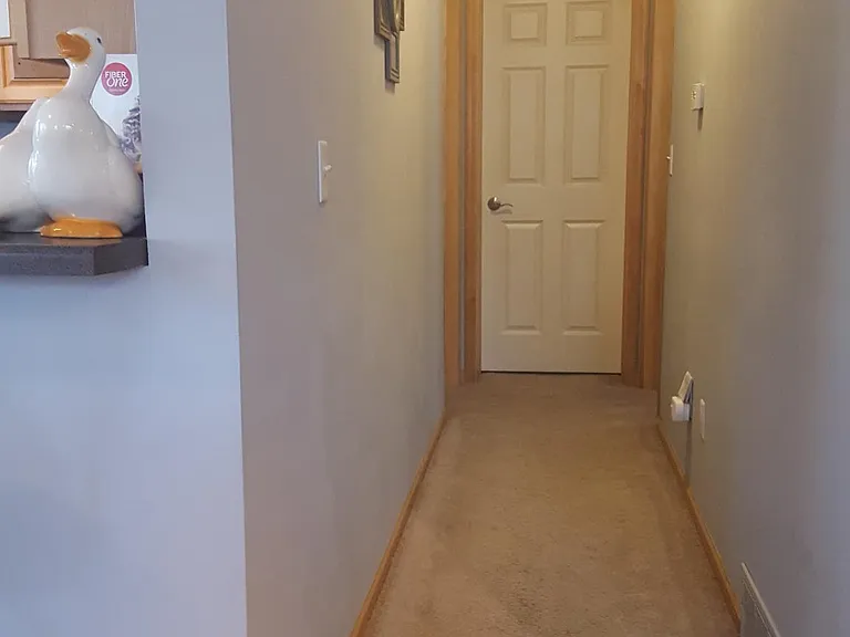Hallway to master bedroom & bath, 2nd bedroom