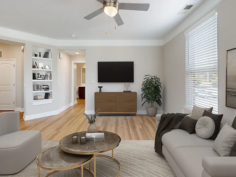 Newly Renovated Living Room with Hardwood-Style Flooring