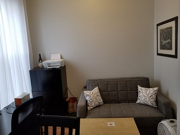 This room can be used as a dining room or an office.