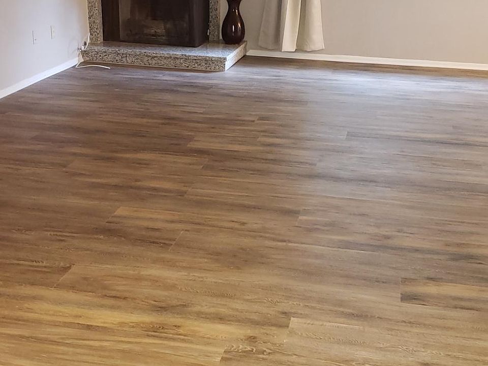 Living room, all new wood vinyl flooring throughout.