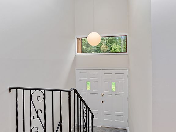2 story entry with new tiled entry floor