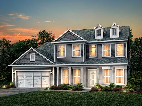 Riverton Exterior 54 features Hardie Board siding, shakes, covered front porch and 2 car garage
