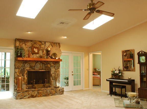 Family Room w/Fireplace and Hallway
