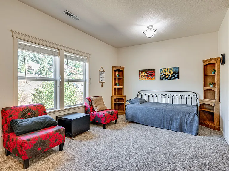 Features a kitchenette, an extra seating area and twin bed with trundle
