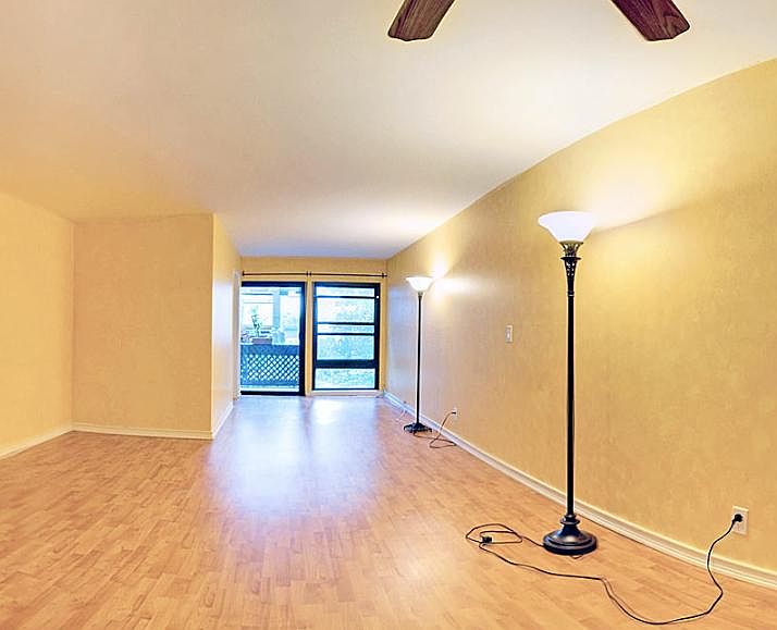 Living room opens onto private patio.