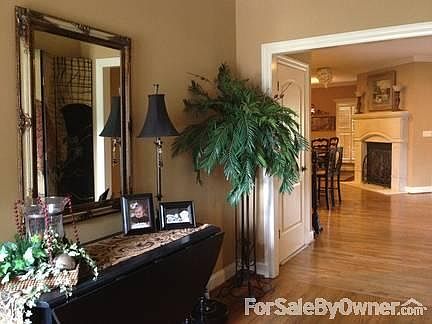 FIREPLACE
						:
						Ventless gas fireplace warms the home in the center of your family area.