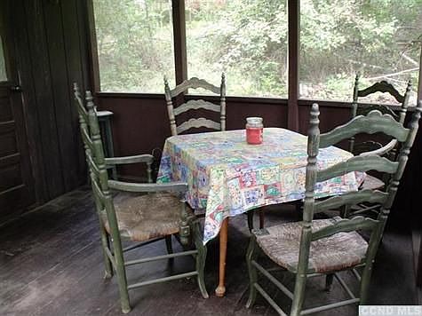 Screened porch off the kitchen.