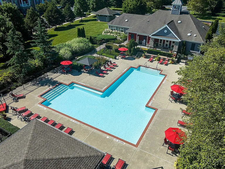 Experience relaxation at this exclusive poolside retreat, perfect for sunny days.