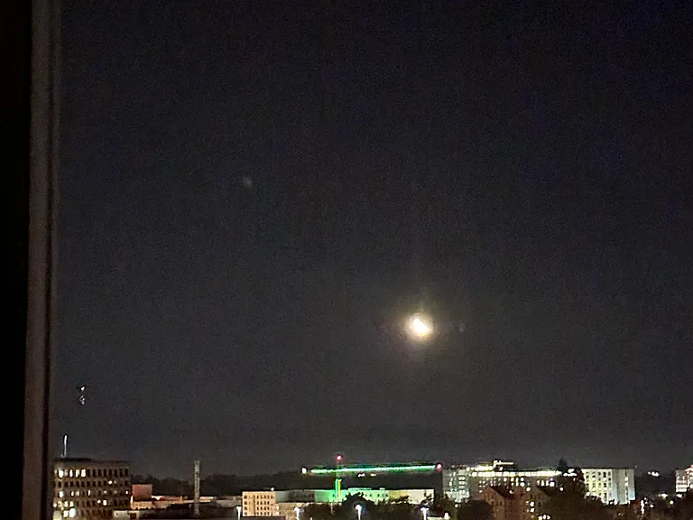 Moonrise over the city