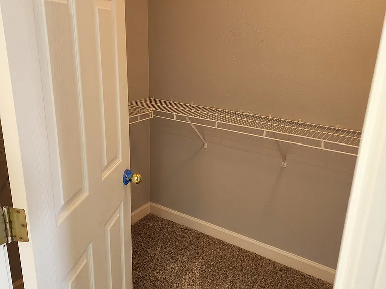 Master bedroom walk in closet 2 (his)