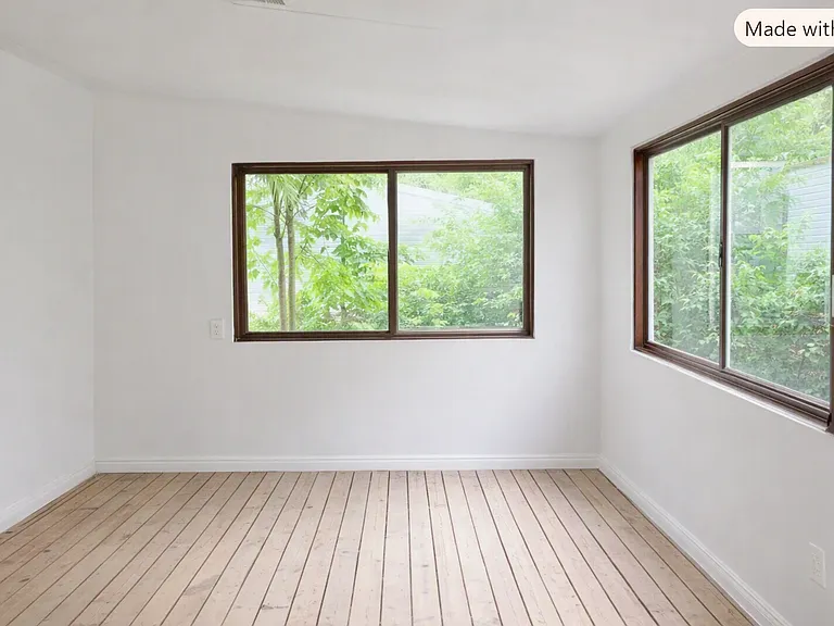 Downstairs off the kitchen is a three-season sun-room.