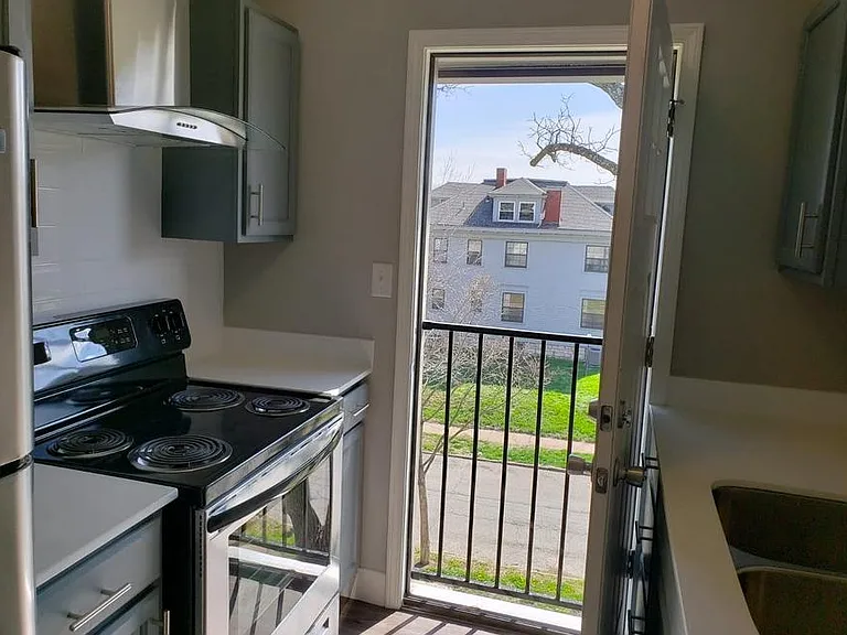 Kitchen with pigeon balcony