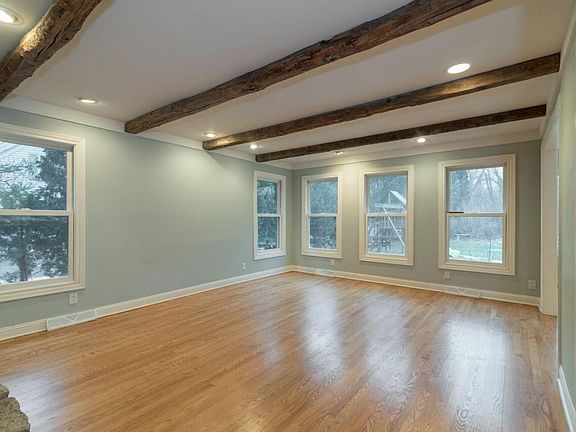 Family Room With Beamed Ceiling