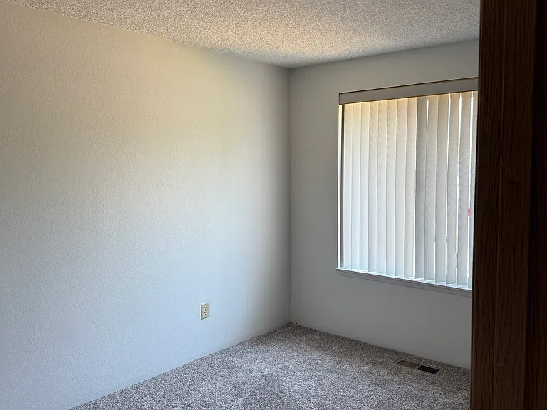 End Bedroom with new carpet.