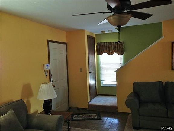 Stairs to upper level beds & bath.