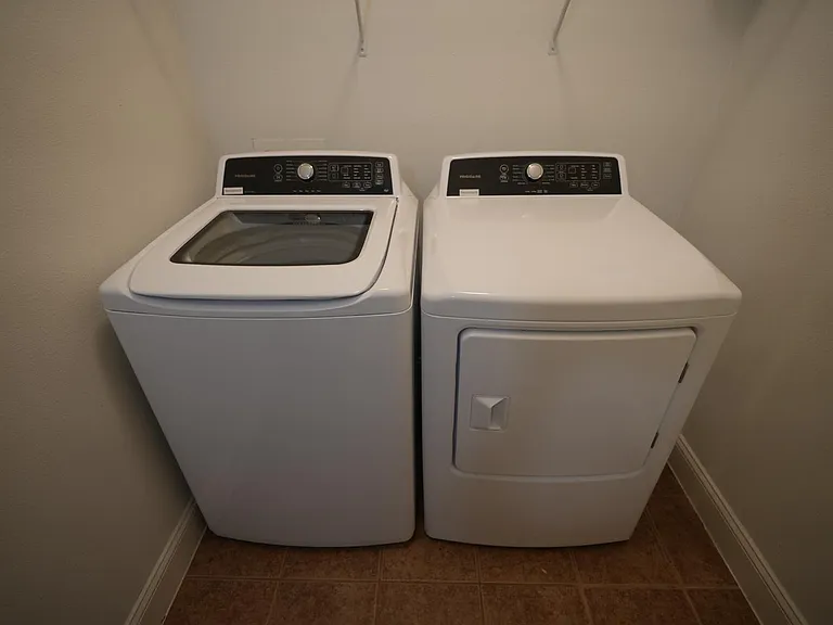 Laundry Room with Washer and Dryer Included
