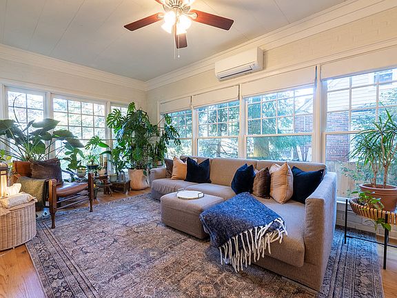 Sunroom. This room now has a desk in it (not shown in photo). The doors to the sunroom close, making it perfect as a second office.