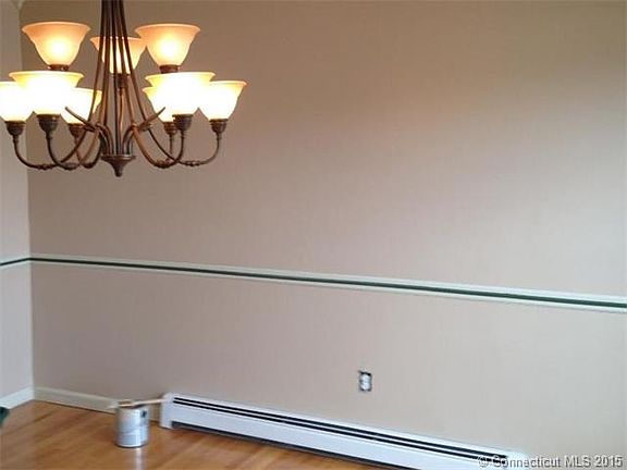 Dining room with hardwood f...
