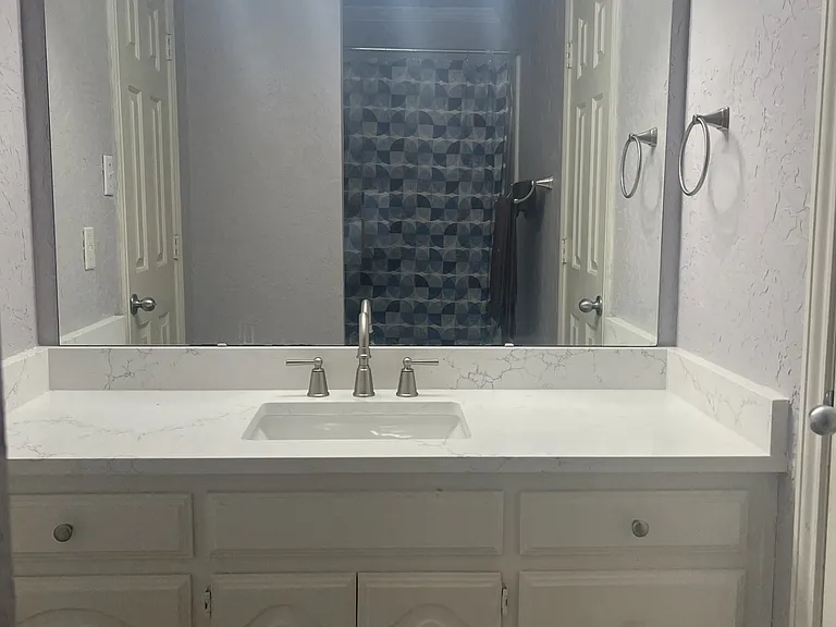 Primary Bathroom sink area. Private space for occupant of primary bedroom.