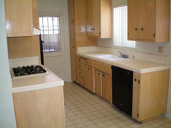 Kitchen of unit #2 taken while vacant 1 year ago