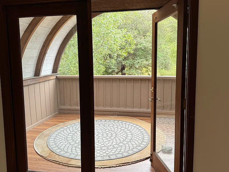 Covered Deck off of Bedroom, View of Garland Park