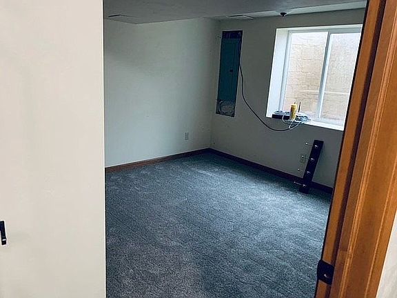 downstairs bedroom with egre