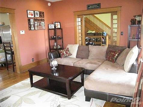Spacious living room open to dining area