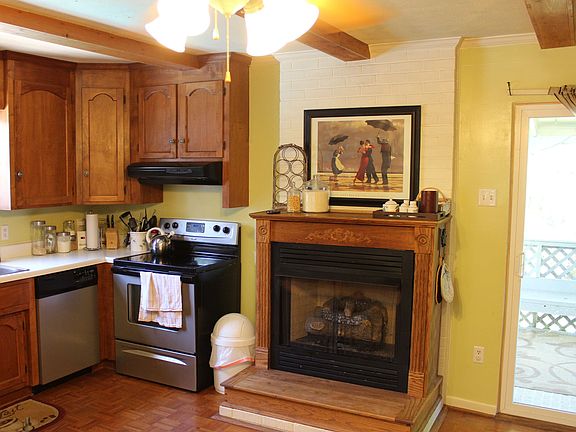 Spacious kitchen with a fireplace