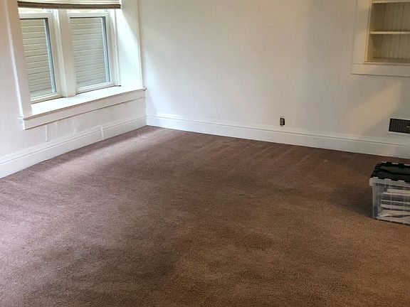 Living room with built-in shelving.