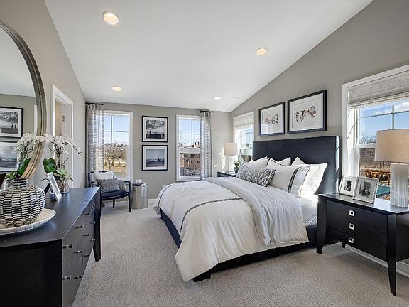 Luxurious primary bedroom suite