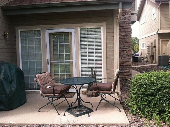 Living Room patio view from sidewalk (on golf course)