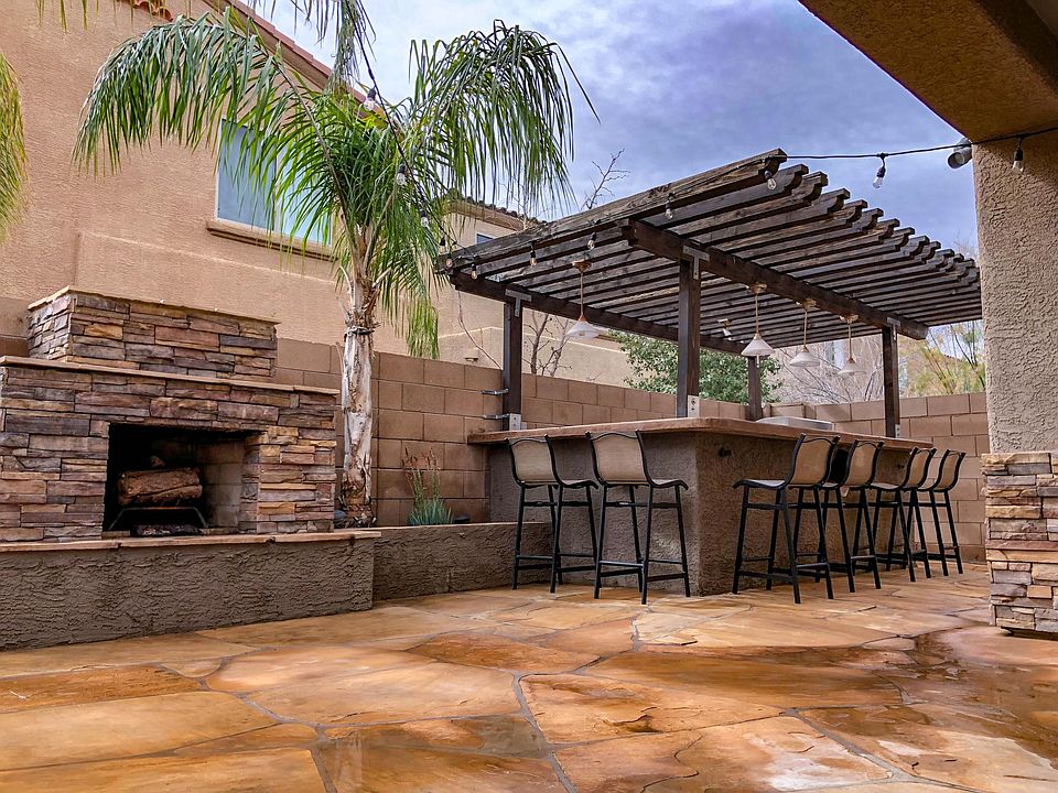 Fully hardscaped back yard with built-in lighting