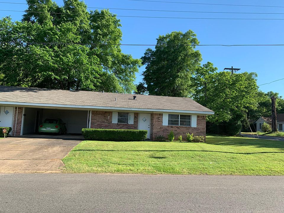 Front view with carport.