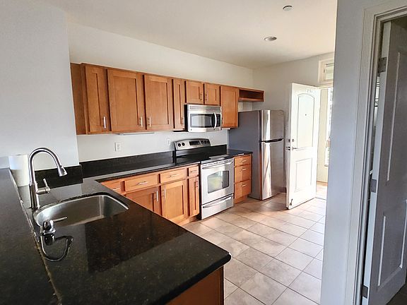 Kitchen and front door.