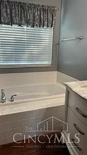 Owners bath soaking tub.