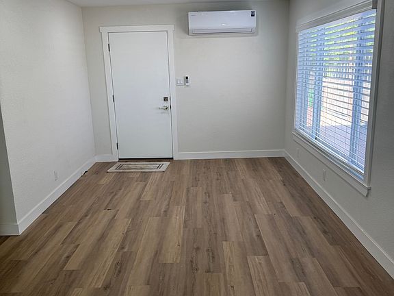 Front door. Large Front Room/Dining Area.