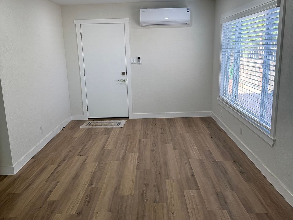 Front door. Large Front Room/Dining Area.