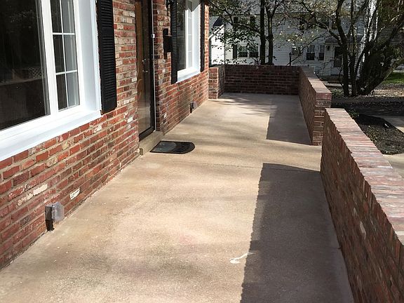 Front patio & new brick wall