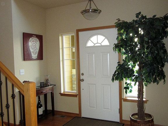 Entry way with hardwood floors