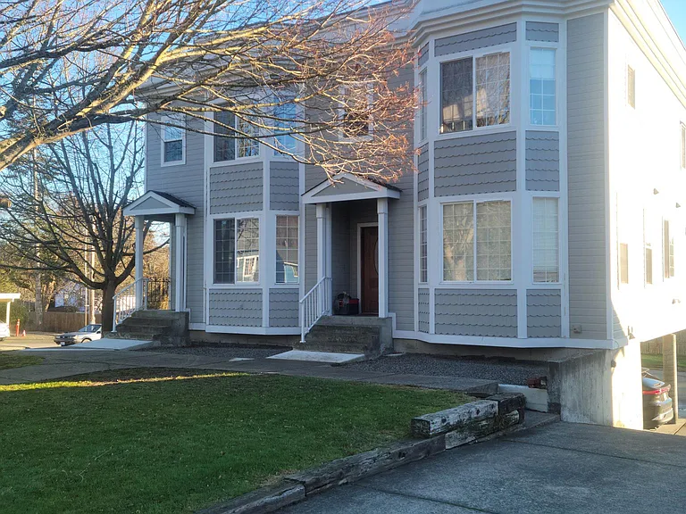Townhouse Apartment with turn of the century accents. Two off street parking spaces available. One covered carport space and one uncovered space.