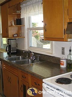 Kitchen window gives great backyard view.