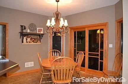 Eat-In-Kitchen : Nice for entertaining with bar area. Beautiful French door and chandelier