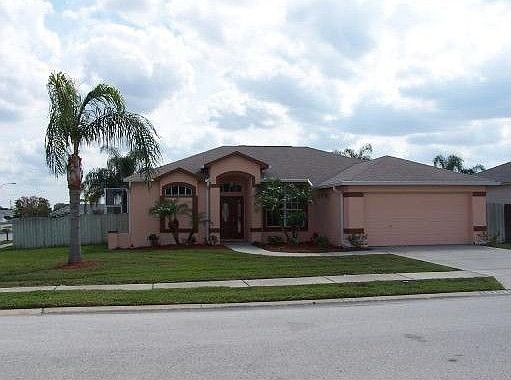 Front View Corner Lot Pool Home