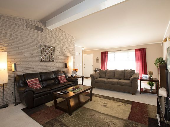 Stone wall is back side of fireplace